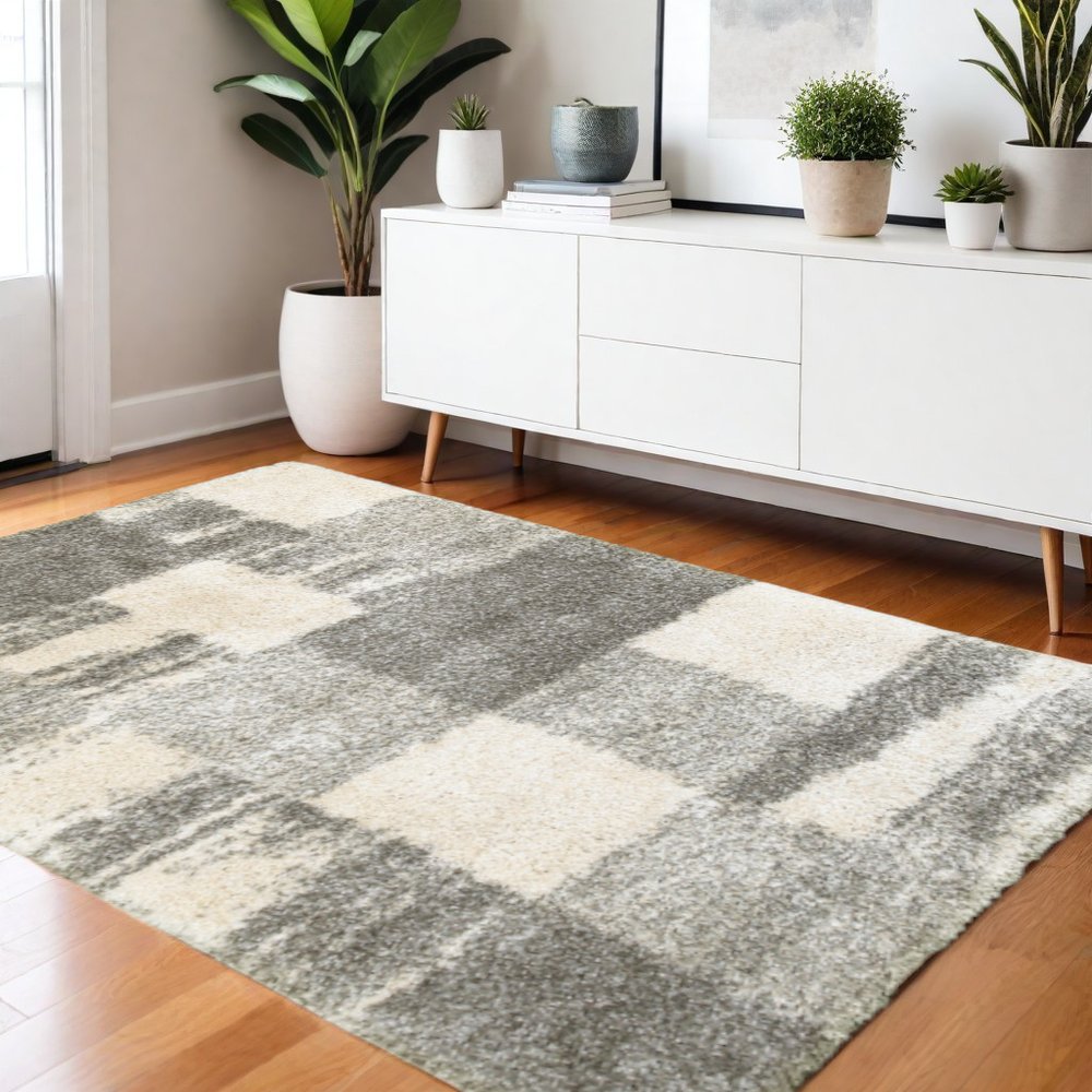 8' X 11' Grey Ivory And Silver Geometric Shag Power Loom Stain Resistant Area Rug
