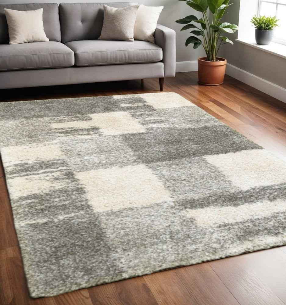 8' X 11' Grey Ivory And Silver Geometric Shag Power Loom Stain Resistant Area Rug