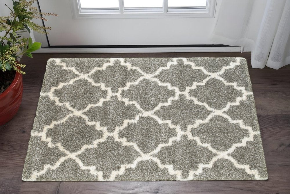 4' X 6' Grey And Ivory Geometric Shag Power Loom Stain Resistant Area Rug