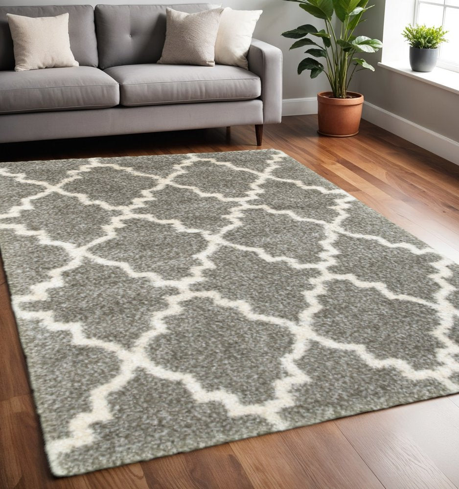 4' X 6' Grey And Ivory Geometric Shag Power Loom Stain Resistant Area Rug