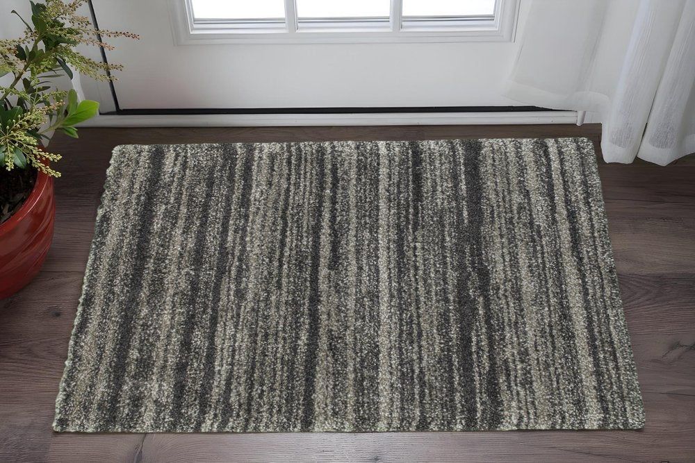 8' X 11' Charcoal Silver And Grey Geometric Shag Power Loom Stain Resistant Area Rug