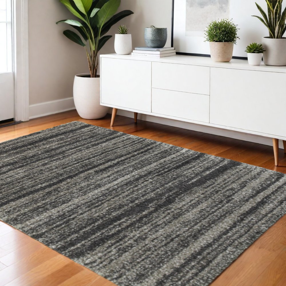 8' X 11' Charcoal Silver And Grey Geometric Shag Power Loom Stain Resistant Area Rug