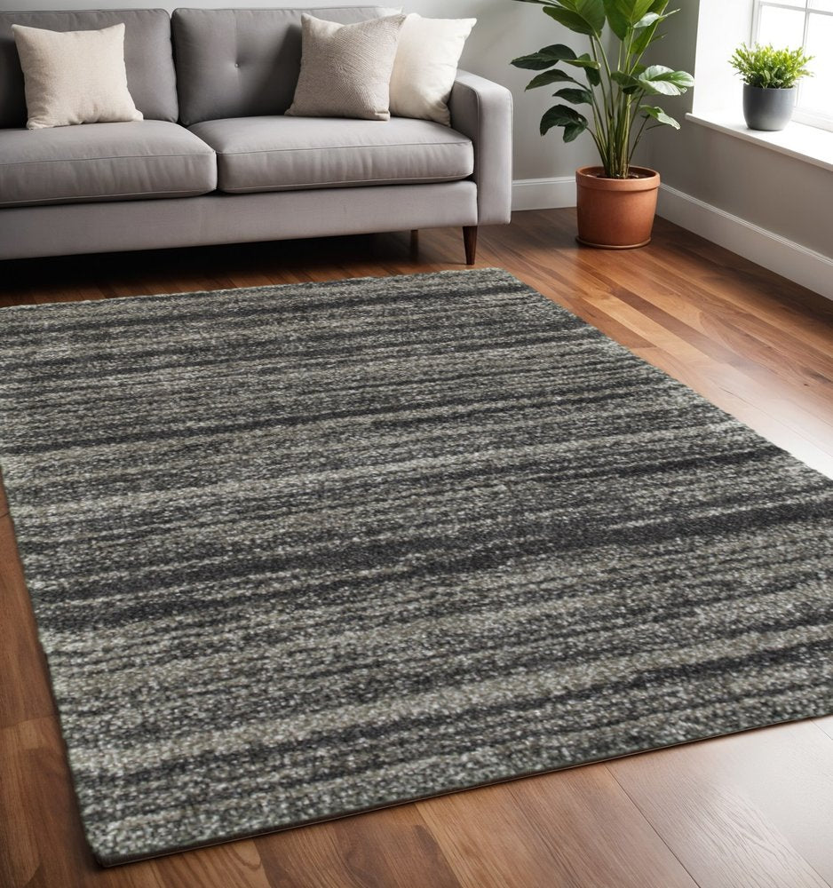 8' X 11' Charcoal Silver And Grey Geometric Shag Power Loom Stain Resistant Area Rug