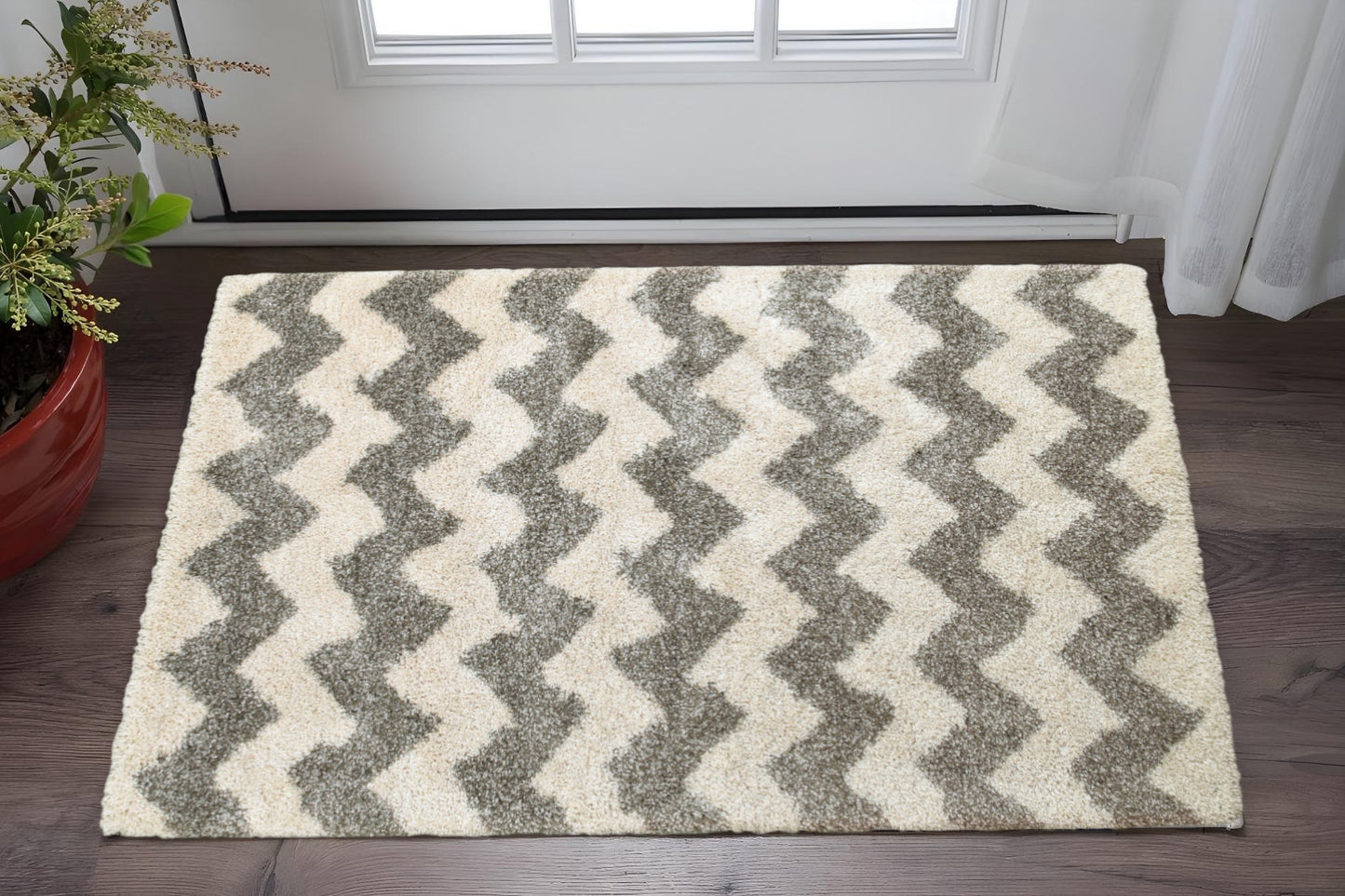 2' X 3' Grey And Ivory Geometric Shag Power Loom Stain Resistant Area Rug