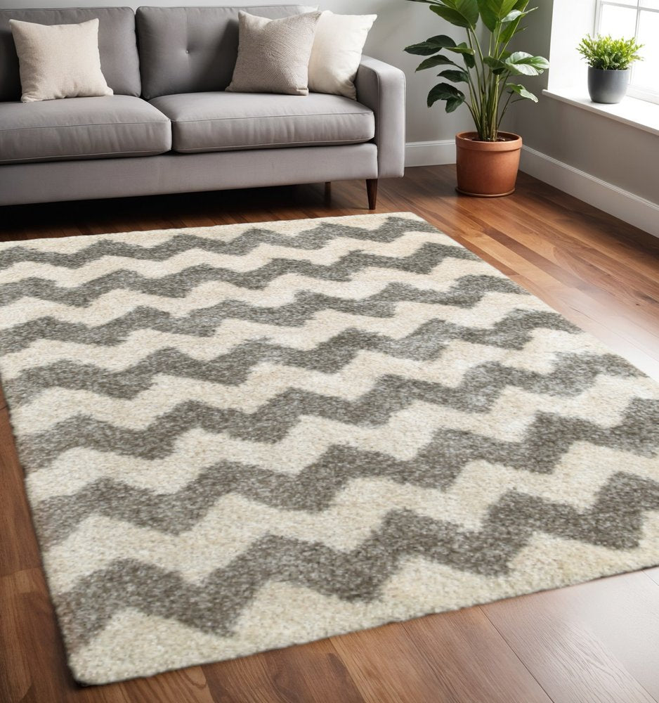 2' X 3' Grey And Ivory Geometric Shag Power Loom Stain Resistant Area Rug