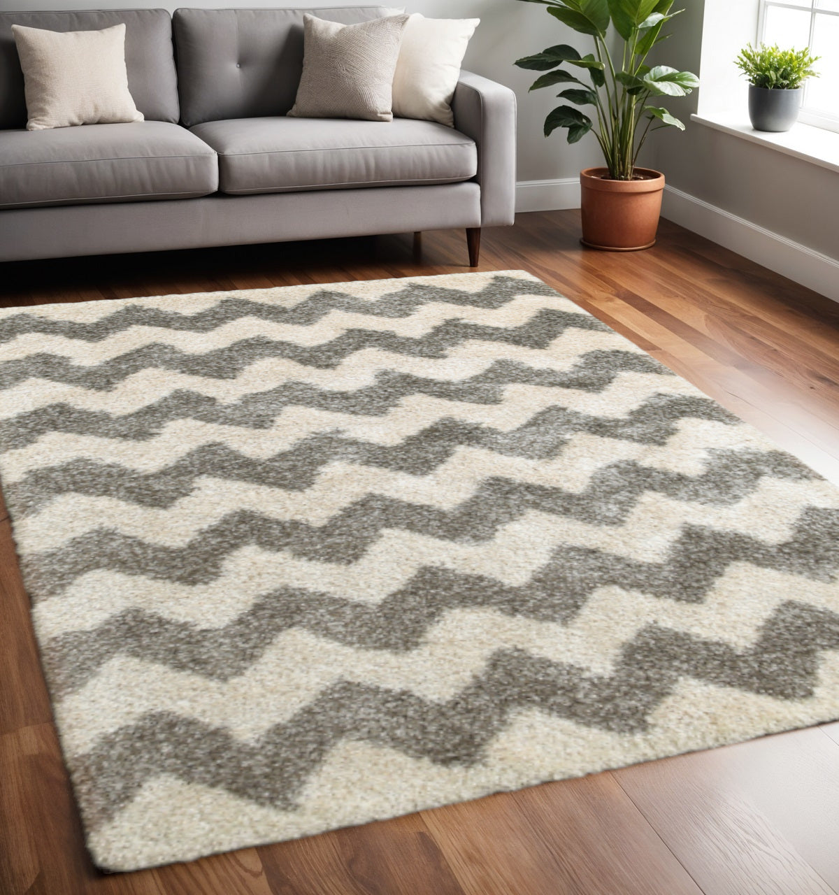 2' X 3' Grey And Ivory Geometric Shag Power Loom Stain Resistant Area Rug