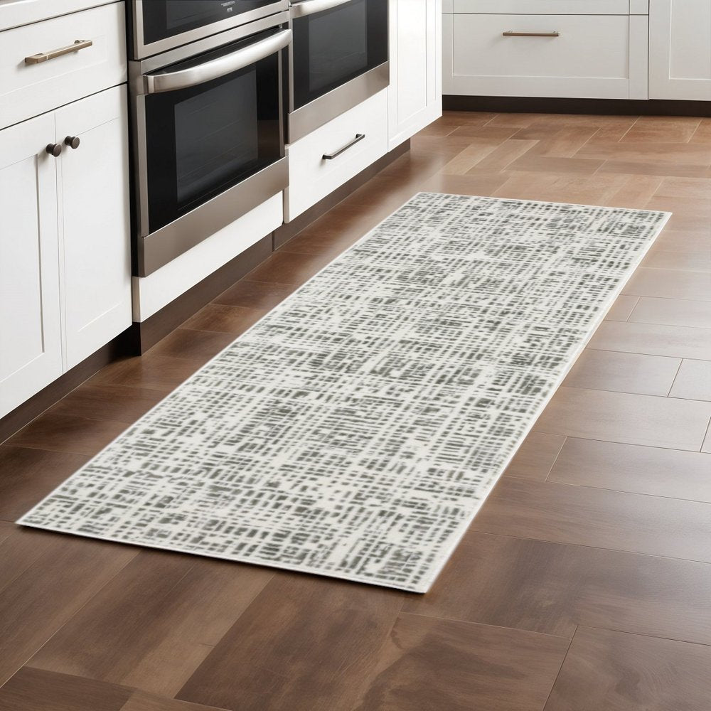 5' X 8' White And Grey Abstract Power Loom Stain Resistant Area Rug