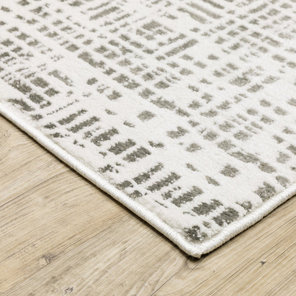 5' X 8' White And Grey Abstract Power Loom Stain Resistant Area Rug