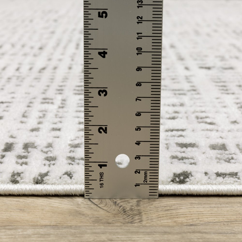 5' X 8' White And Grey Abstract Power Loom Stain Resistant Area Rug