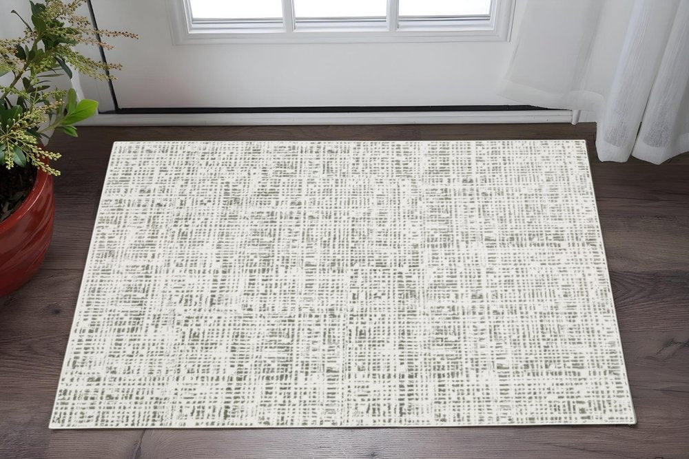 5' X 8' White And Grey Abstract Power Loom Stain Resistant Area Rug