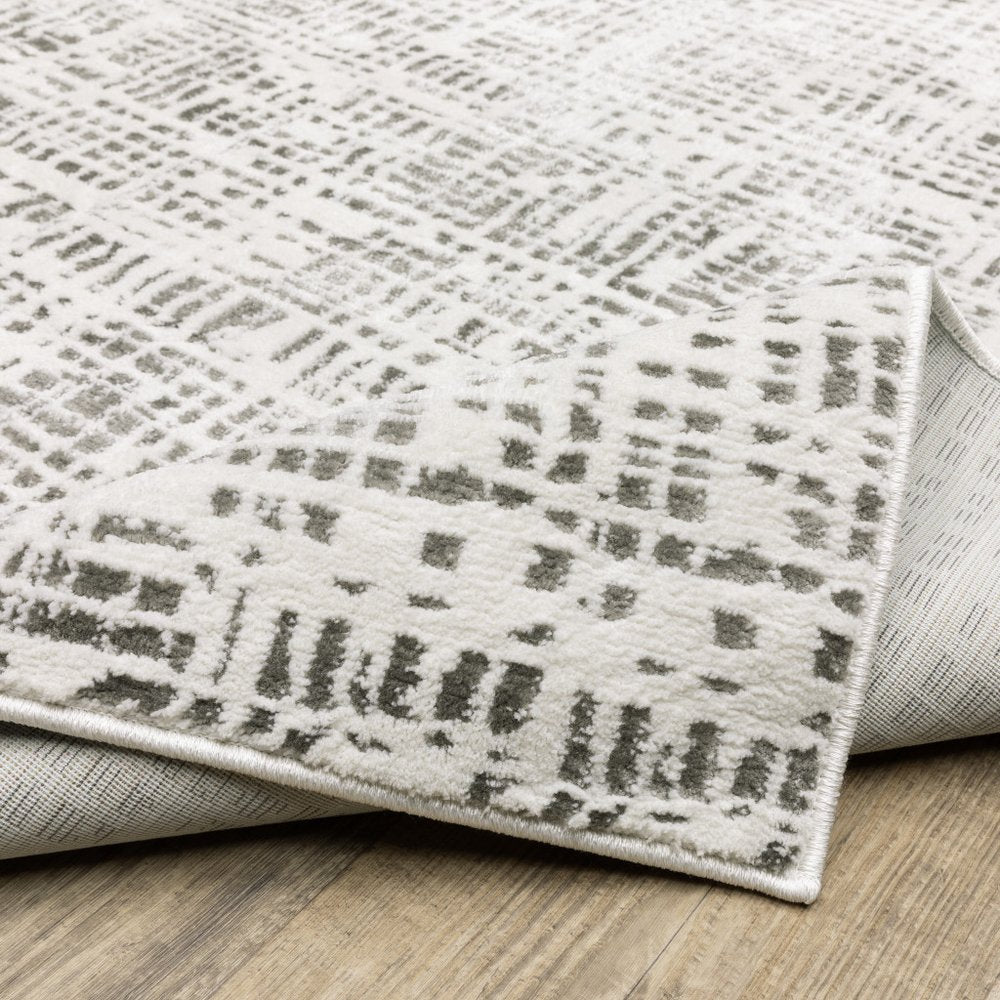 5' X 8' White And Grey Abstract Power Loom Stain Resistant Area Rug