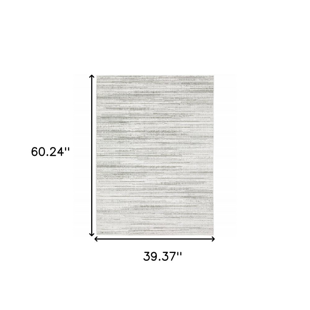 2' X 8' White And Grey Abstract Power Loom Stain Resistant Runner Rug