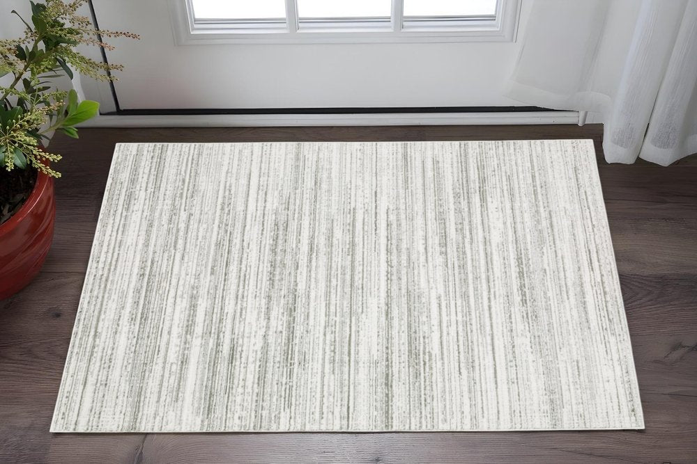2' X 8' White And Grey Abstract Power Loom Stain Resistant Runner Rug