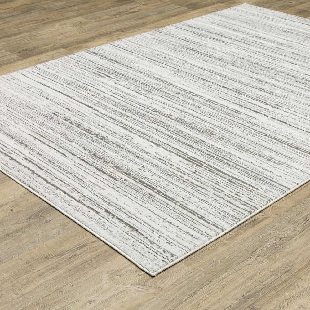 2' X 8' White And Grey Abstract Power Loom Stain Resistant Runner Rug