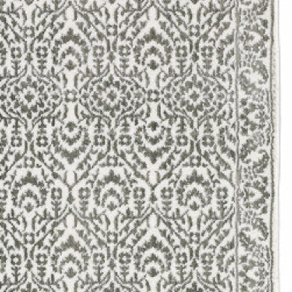 5' X 8' Grey And White Floral Power Loom Stain Resistant Area Rug
