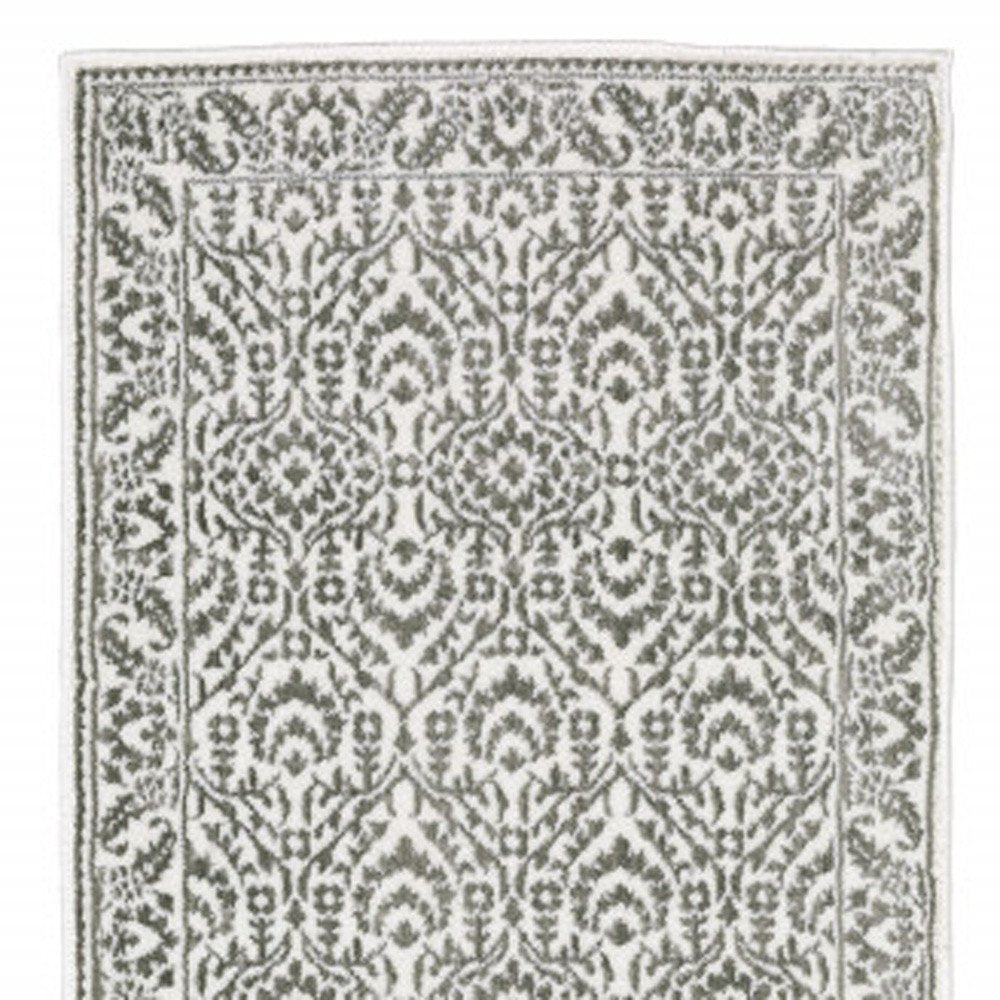 5' X 8' Grey And White Floral Power Loom Stain Resistant Area Rug