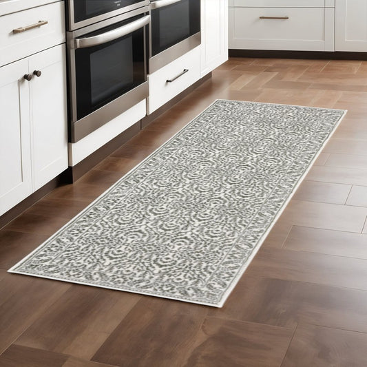5' X 8' Grey And White Floral Power Loom Stain Resistant Area Rug