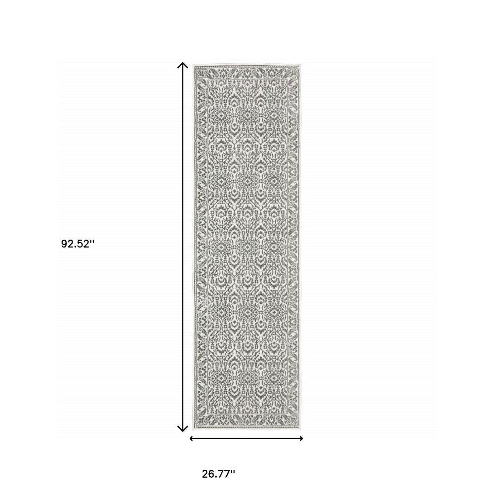 5' X 8' Grey And White Floral Power Loom Stain Resistant Area Rug