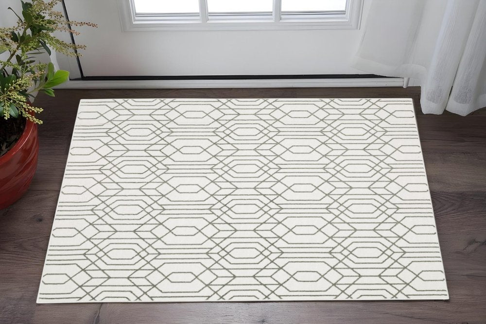 2' X 8' White And Grey Geometric Power Loom Stain Resistant Runner Rug