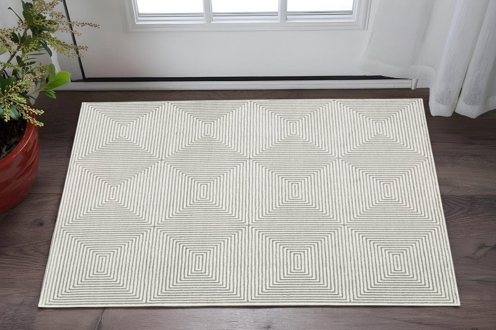 2' X 8' Grey And White Geometric Power Loom Stain Resistant Runner Rug