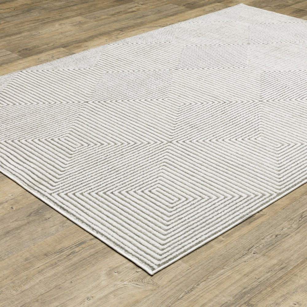 2' X 8' Grey And White Geometric Power Loom Stain Resistant Runner Rug