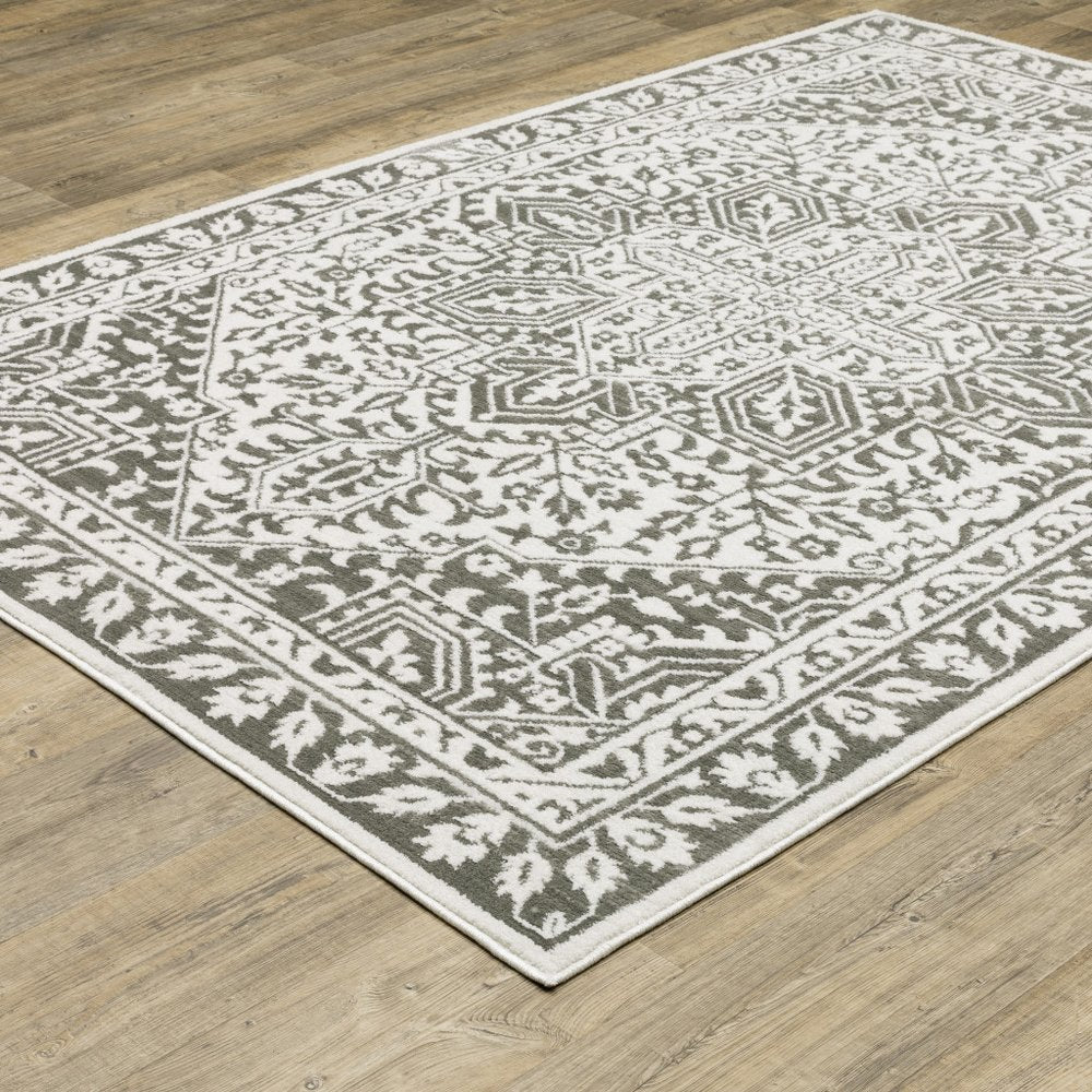 2' X 8' Grey And White Oriental Power Loom Stain Resistant Runner Rug