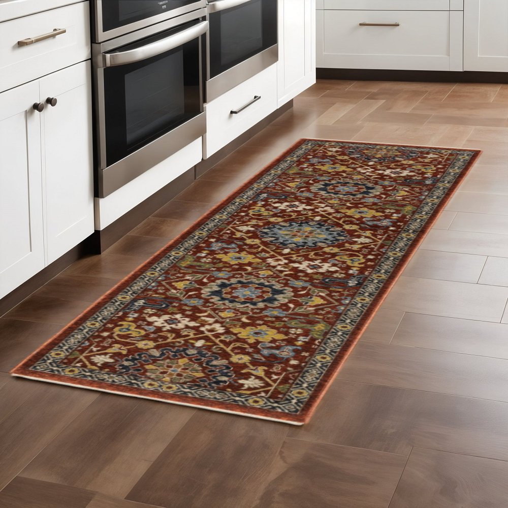 10' X 13' Blue Red Ivory And Gold Oriental Power Loom Stain Resistant Area Rug With Fringe