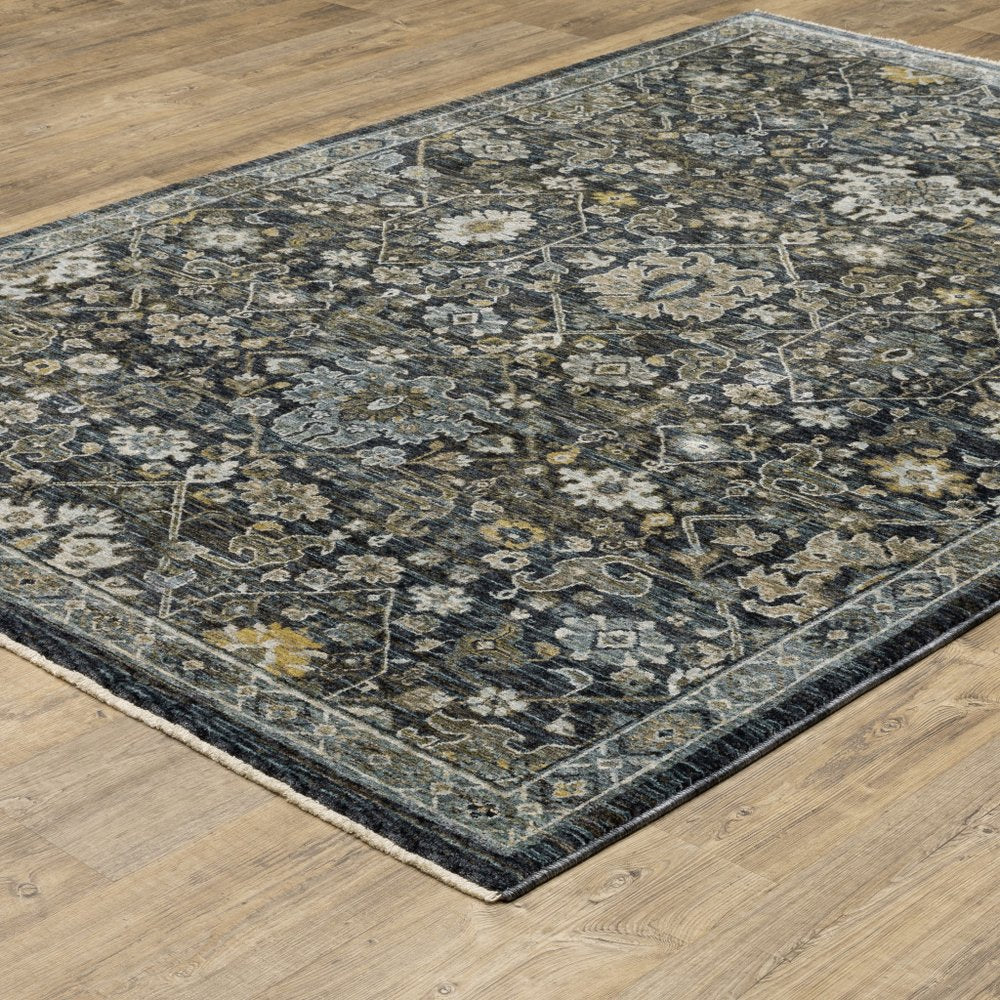 5' X 8' Blue Ivory Grey Gold Green And Brown Oriental Power Loom Stain Resistant Area Rug With Fringe