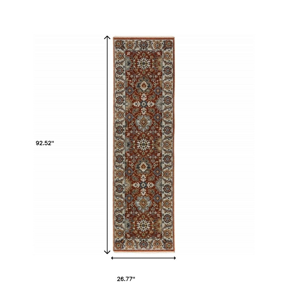 2' X 3' Red Blue Ivory Gold And Navy Oriental Power Loom Stain Resistant Area Rug With Fringe