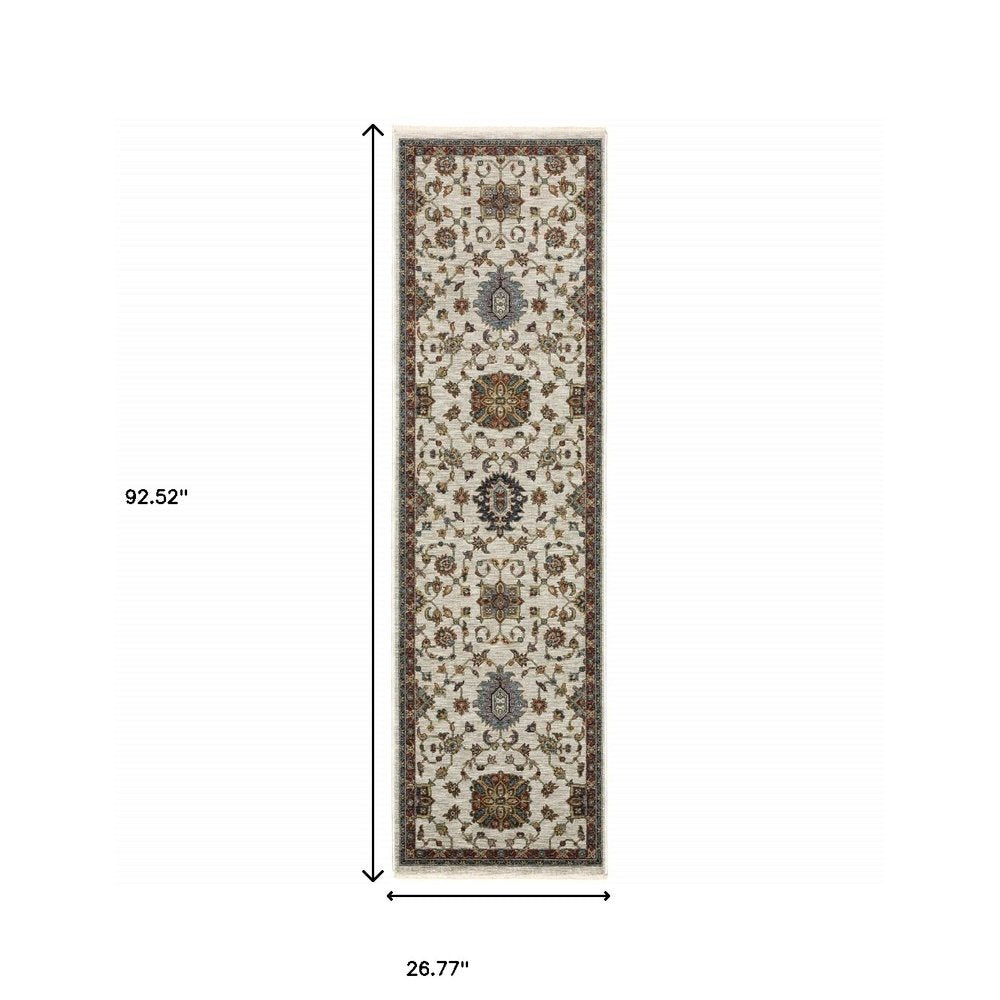 5' X 8' Beige Rust Red Blue Gold And Grey Oriental Power Loom Stain Resistant Area Rug With Fringe