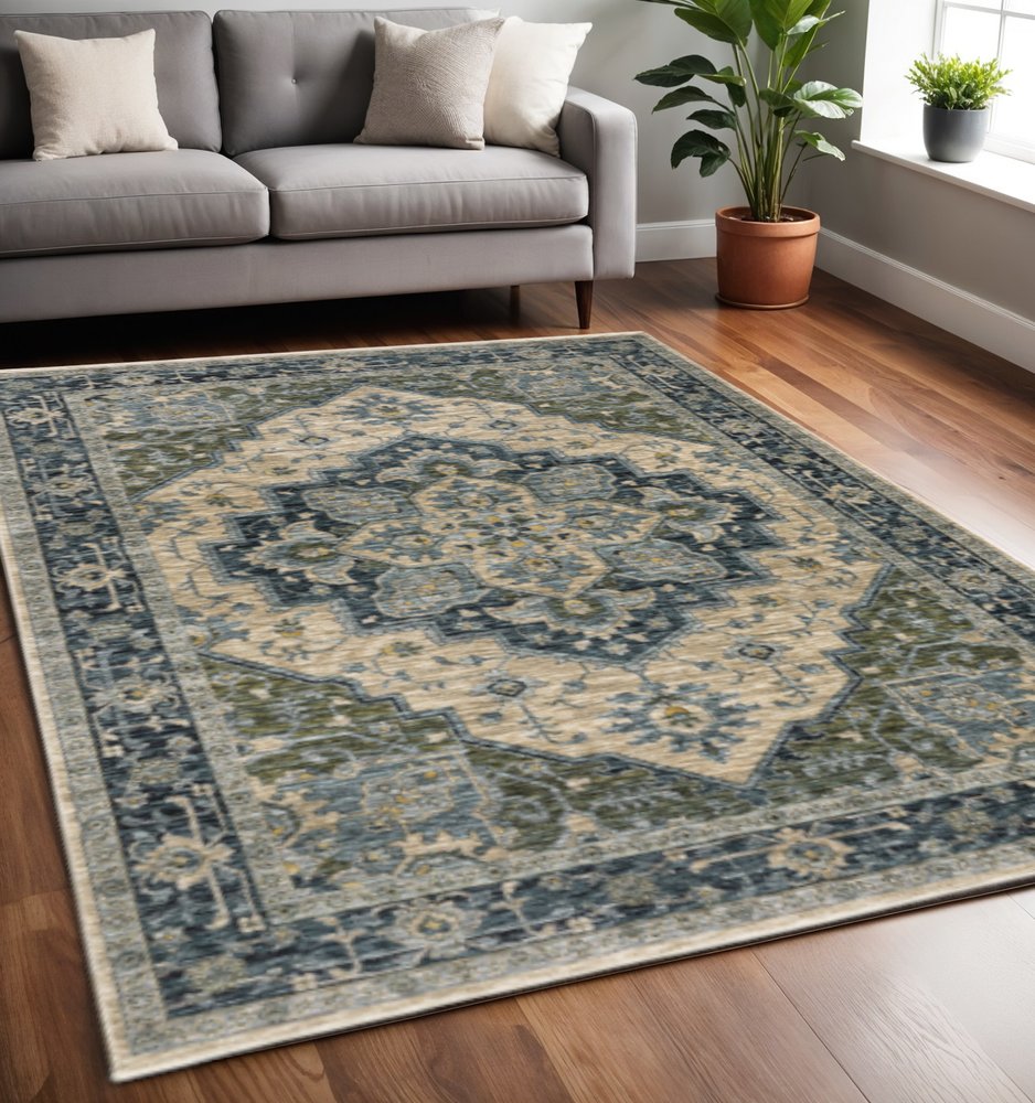 5' X 8' Blue Grey Beige Tan Green And Gold Oriental Power Loom Stain Resistant Area Rug With Fringe