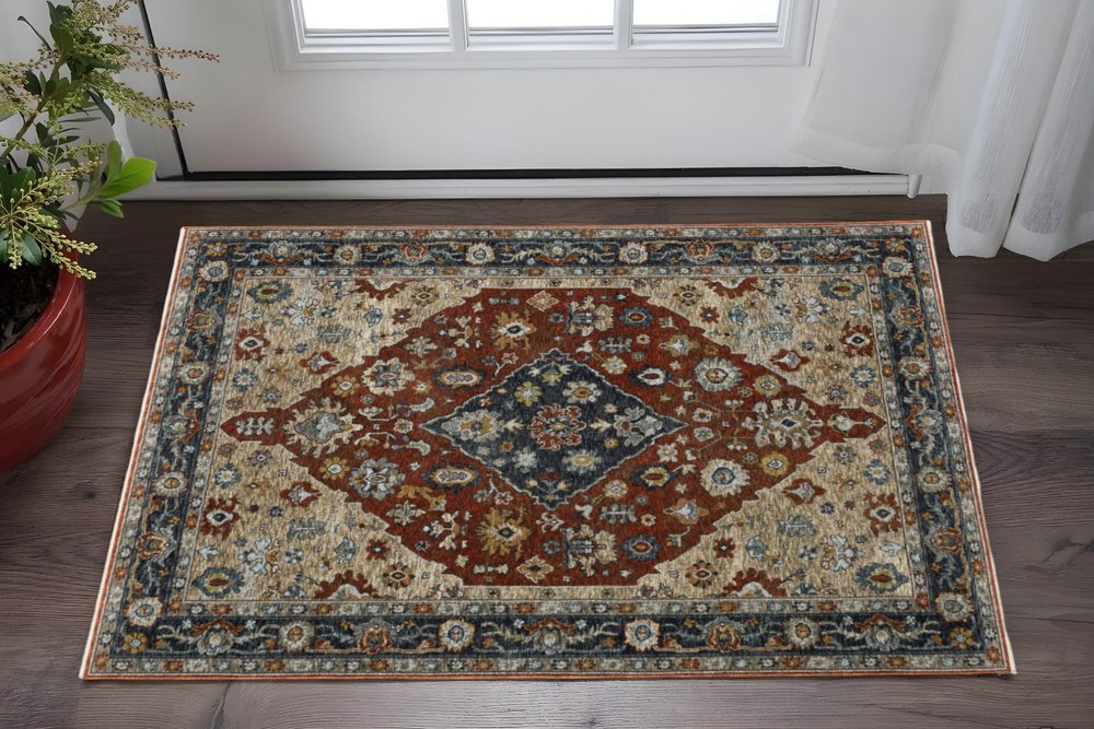 2' X 8' Blue Beige Tan Brown Gold And Rust Red Oriental Power Loom Stain Resistant Runner Rug With Fringe