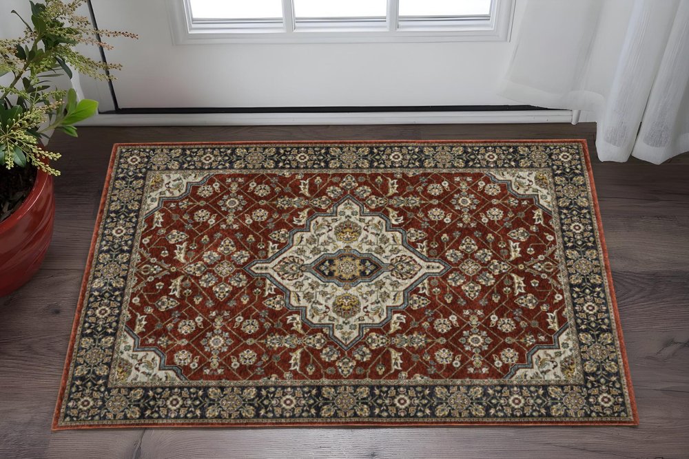 2' X 8' Red Ivory Blue Navy Gold And Grey Oriental Power Loom Stain Resistant Runner Rug With Fringe