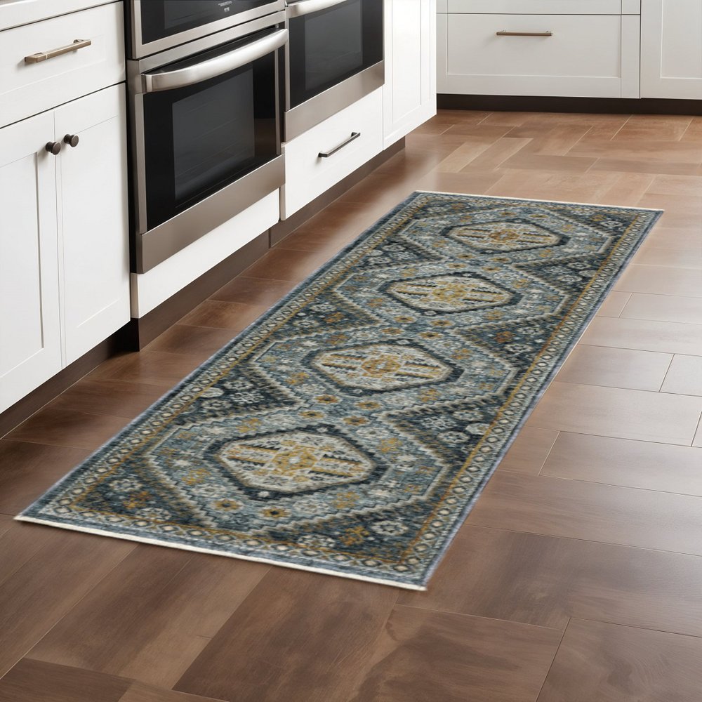 2' X 8' Blue Gold Ivory And Navy Oriental Power Loom Stain Resistant Runner Rug With Fringe