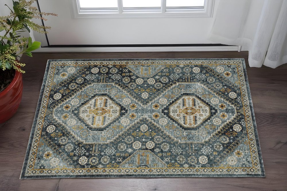 2' X 8' Blue Gold Ivory And Navy Oriental Power Loom Stain Resistant Runner Rug With Fringe