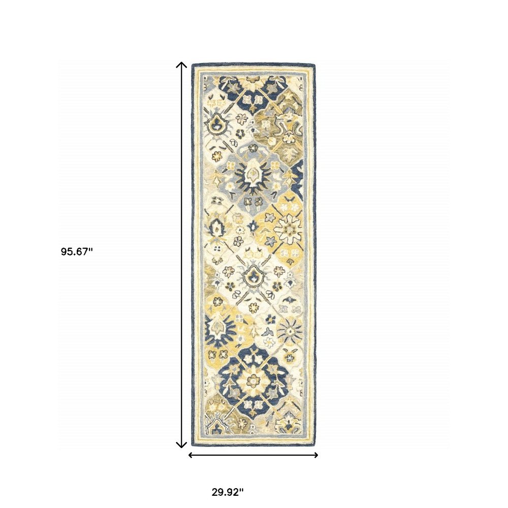 4' X 6' Blue Green Gold Navy And Ivory Geometric Tufted Handmade Stain Resistant Area Rug