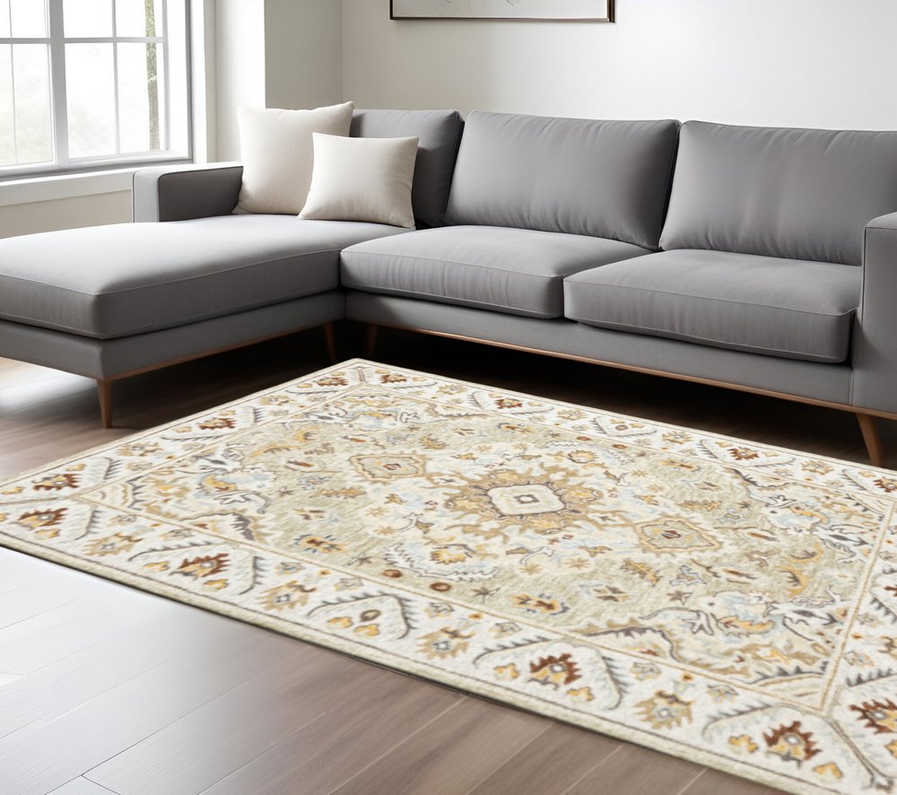 5' X 8' Ivory Beige Gold And Muted Grey Oriental Tufted Handmade Stain Resistant Area Rug