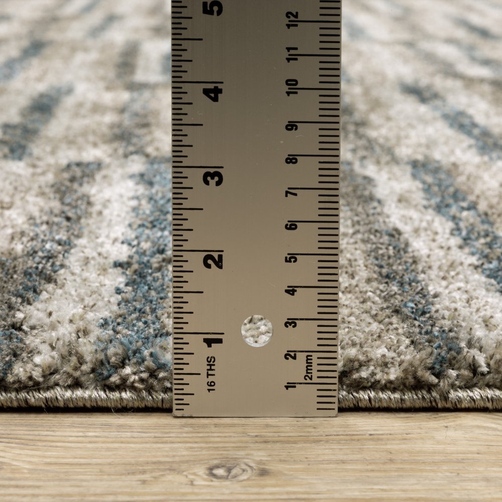 5' X 8' Teal Blue Geometric Power Loom Area Rug