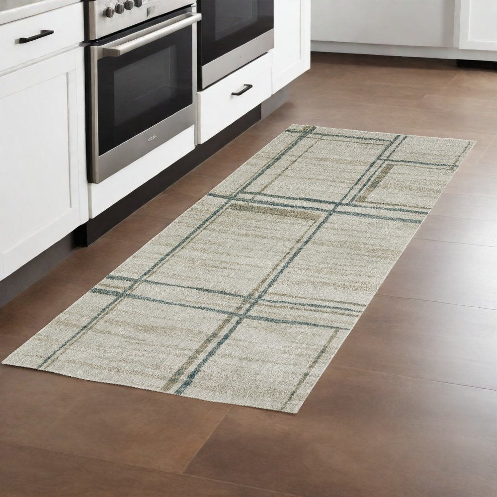 7' X 10' Grey Teal Beige and Tan Geometric Power Loom Area Rug