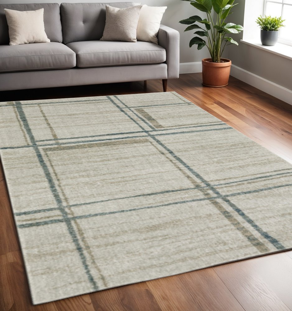 7' X 10' Grey Teal Beige and Tan Geometric Power Loom Area Rug