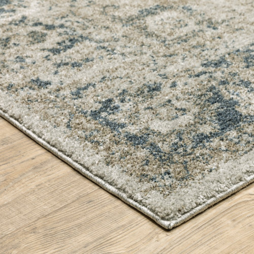 5' X 8' Beige And Blue Oriental Distressed Area Rug