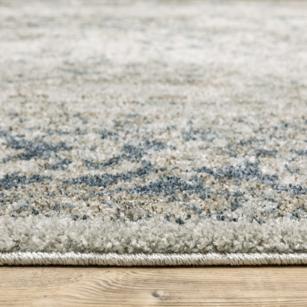 5' X 8' Beige And Blue Oriental Distressed Area Rug