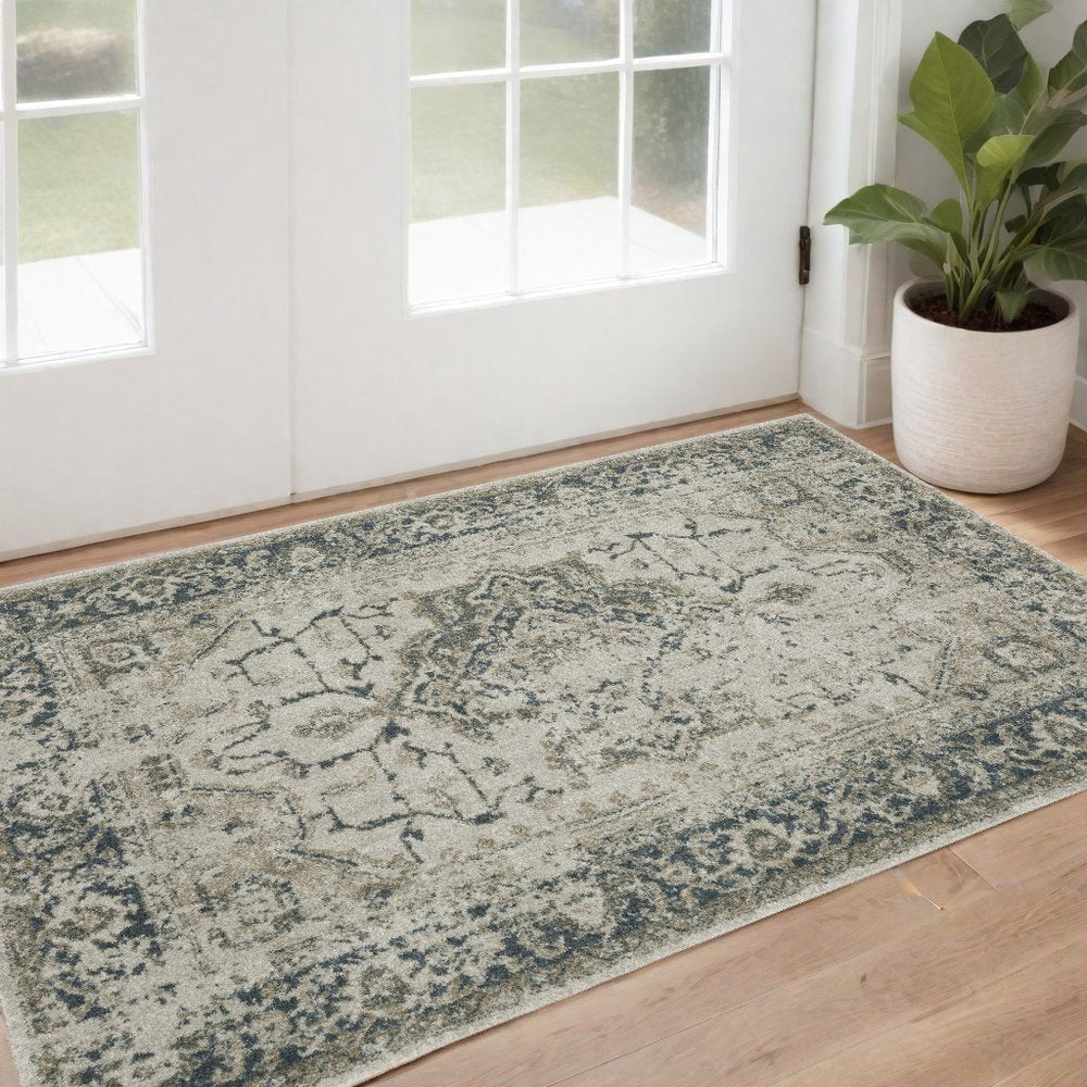 5' X 8' Beige And Blue Oriental Distressed Area Rug