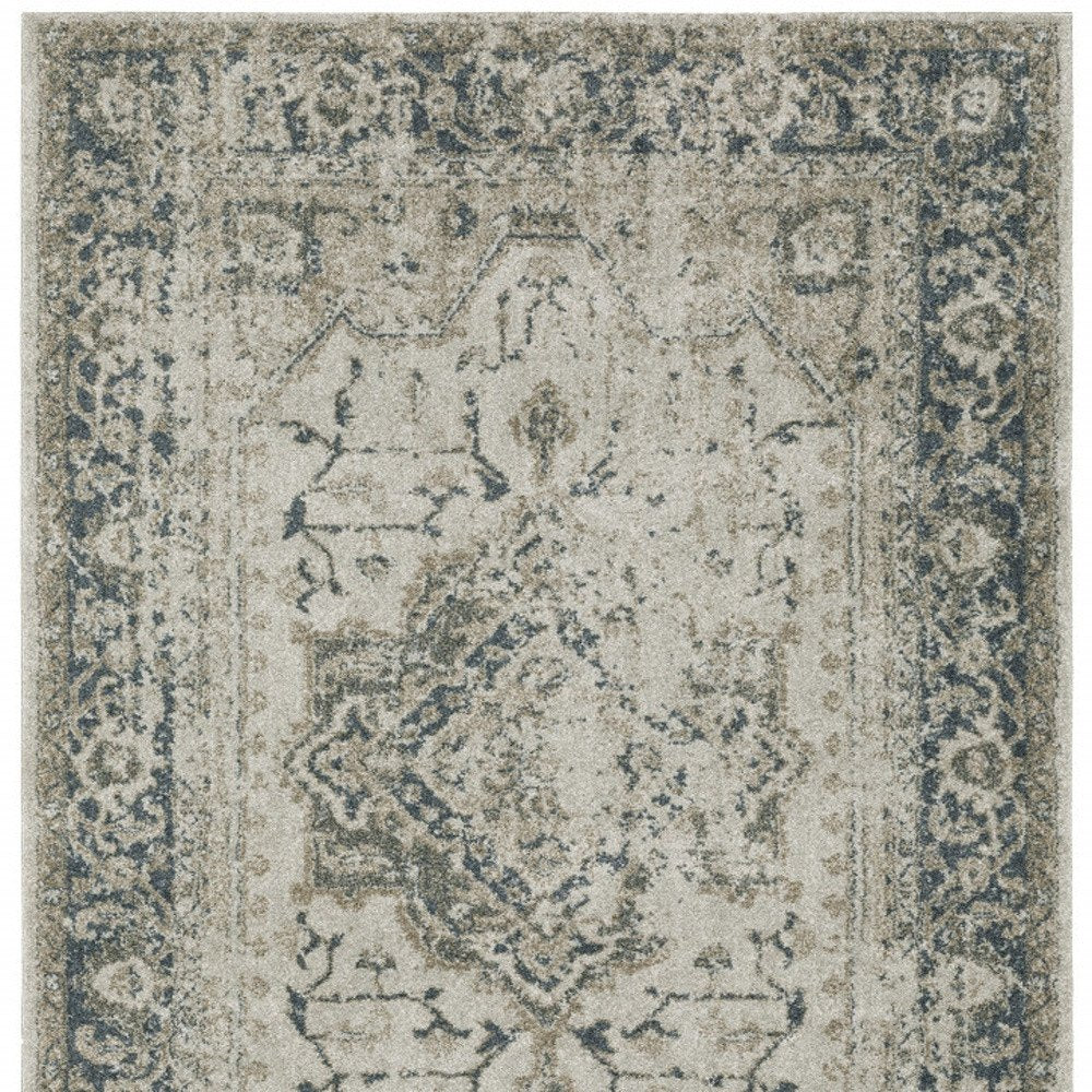 5' X 8' Beige And Blue Oriental Distressed Area Rug