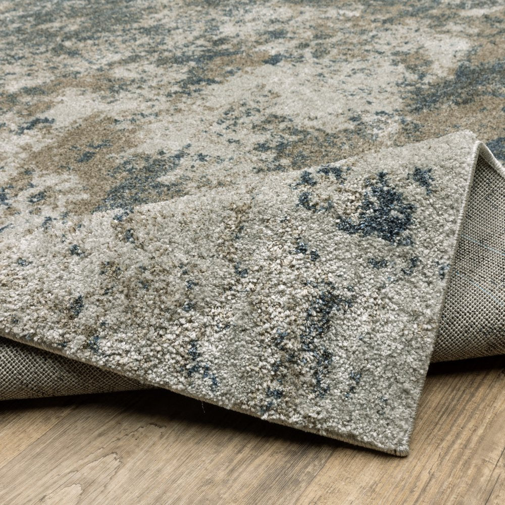 5' X 8' Tan and Gray Abstract Power Loom Area Rug