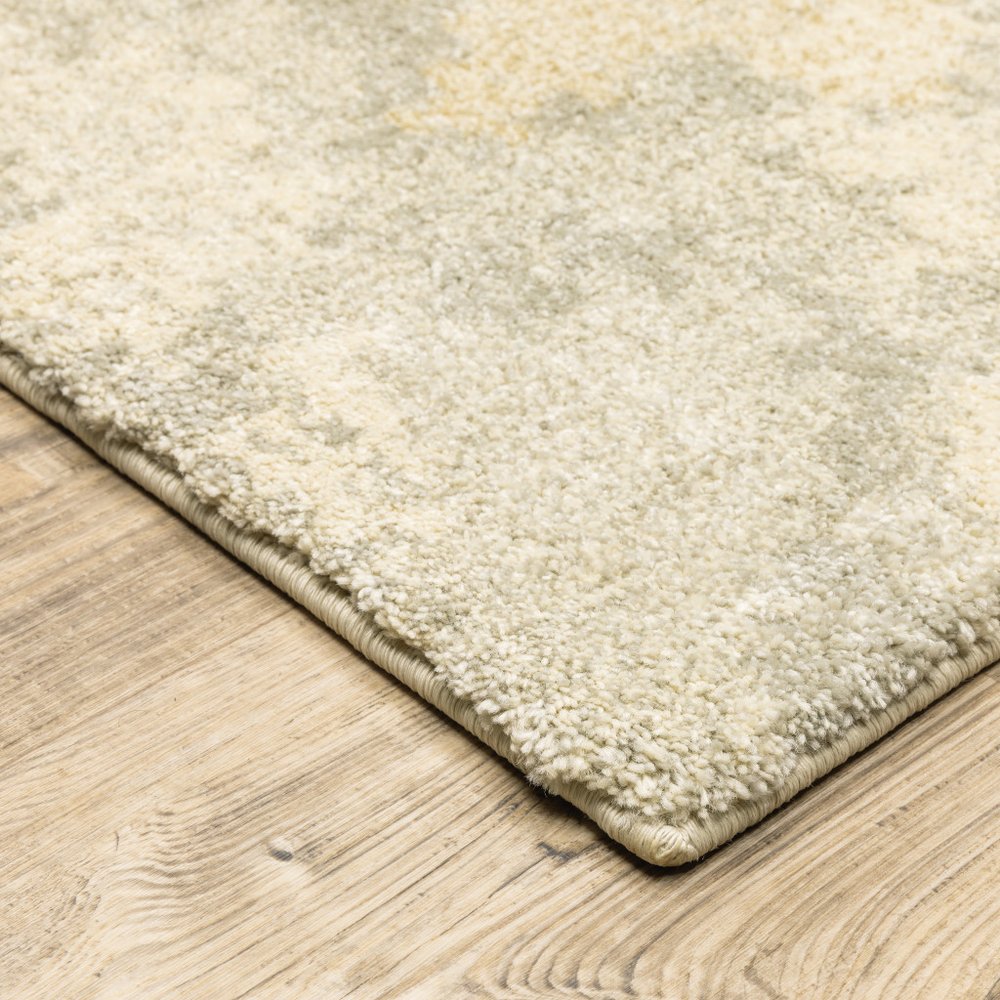 10' X 13' Beige And Gold Abstract Area Rug