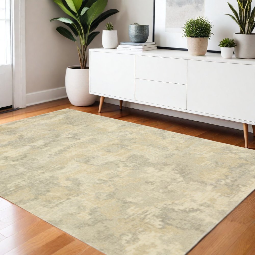 10' X 13' Beige And Gold Abstract Area Rug