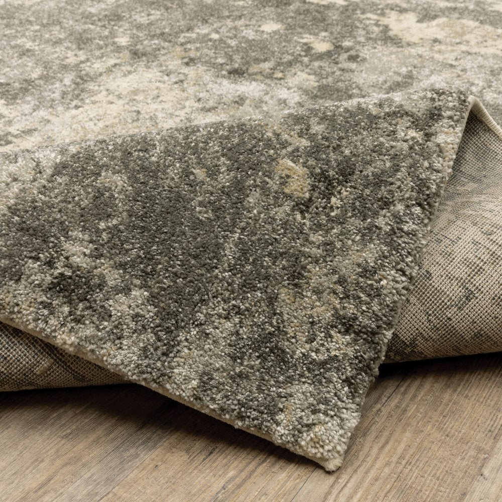 3' X 5' Charcoal Grey Beige And Tan Abstract Power Loom Stain Resistant Area Rug