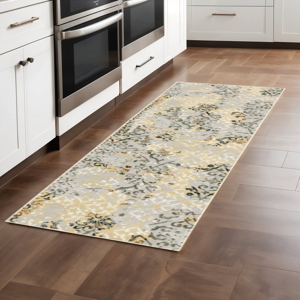 4' X 6' Grey And Gold Abstract Power Loom Stain Resistant Area Rug