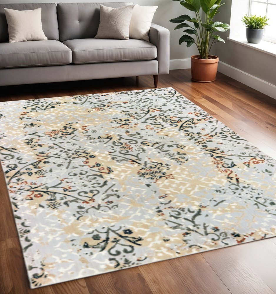 4' X 6' Grey And Gold Abstract Power Loom Stain Resistant Area Rug